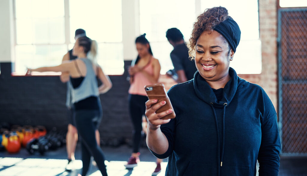 Woman excited that she has helped to create a successful wellness program.