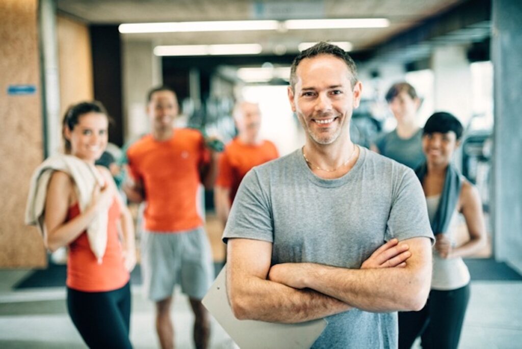 Workers using their office gym promoting a healthy lifestyle. 