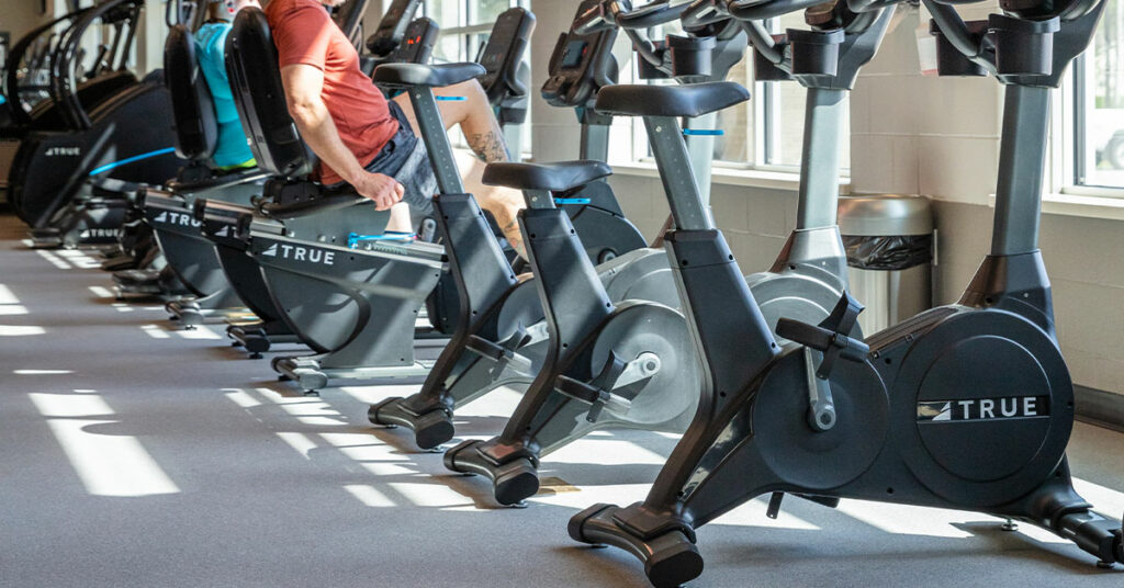 Upright vs. Recumbent Bikes: Which One To Buy for Your YMCA