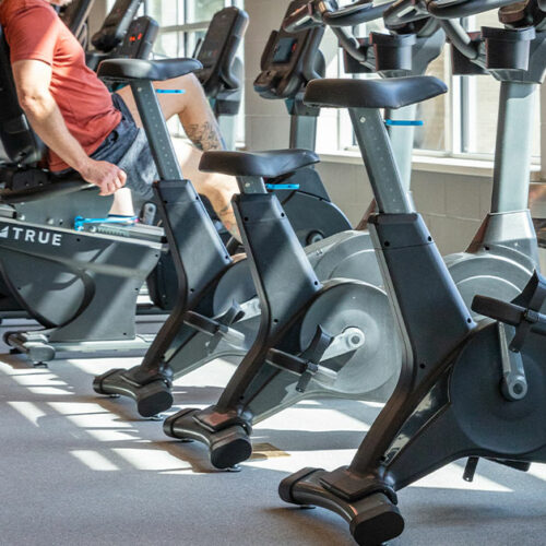 Upright vs. Recumbent Bikes: Which One To Buy for Your YMCA