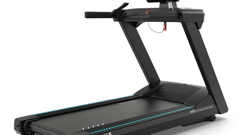 A modern black treadmill with a large touchscreen display, control buttons, safety clip, and sturdy handrails, positioned on a white background. The brand TRUE is visible on the base.